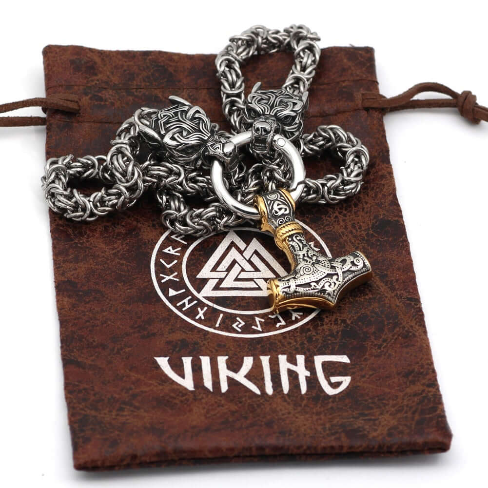 Braided King Chain With Twin Wolf Heads Holding A Mjolnir Pendant