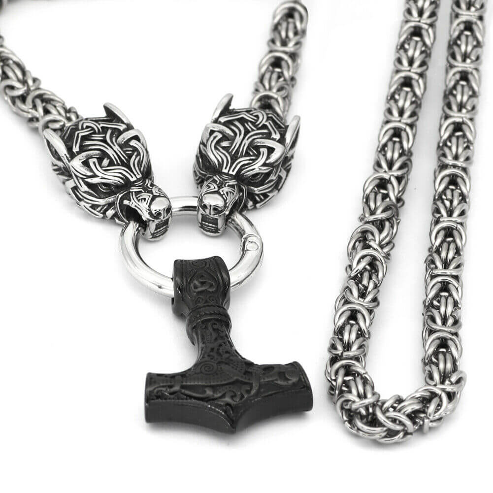 Braided King Chain With Twin Wolf Heads Holding A Mjolnir Pendant